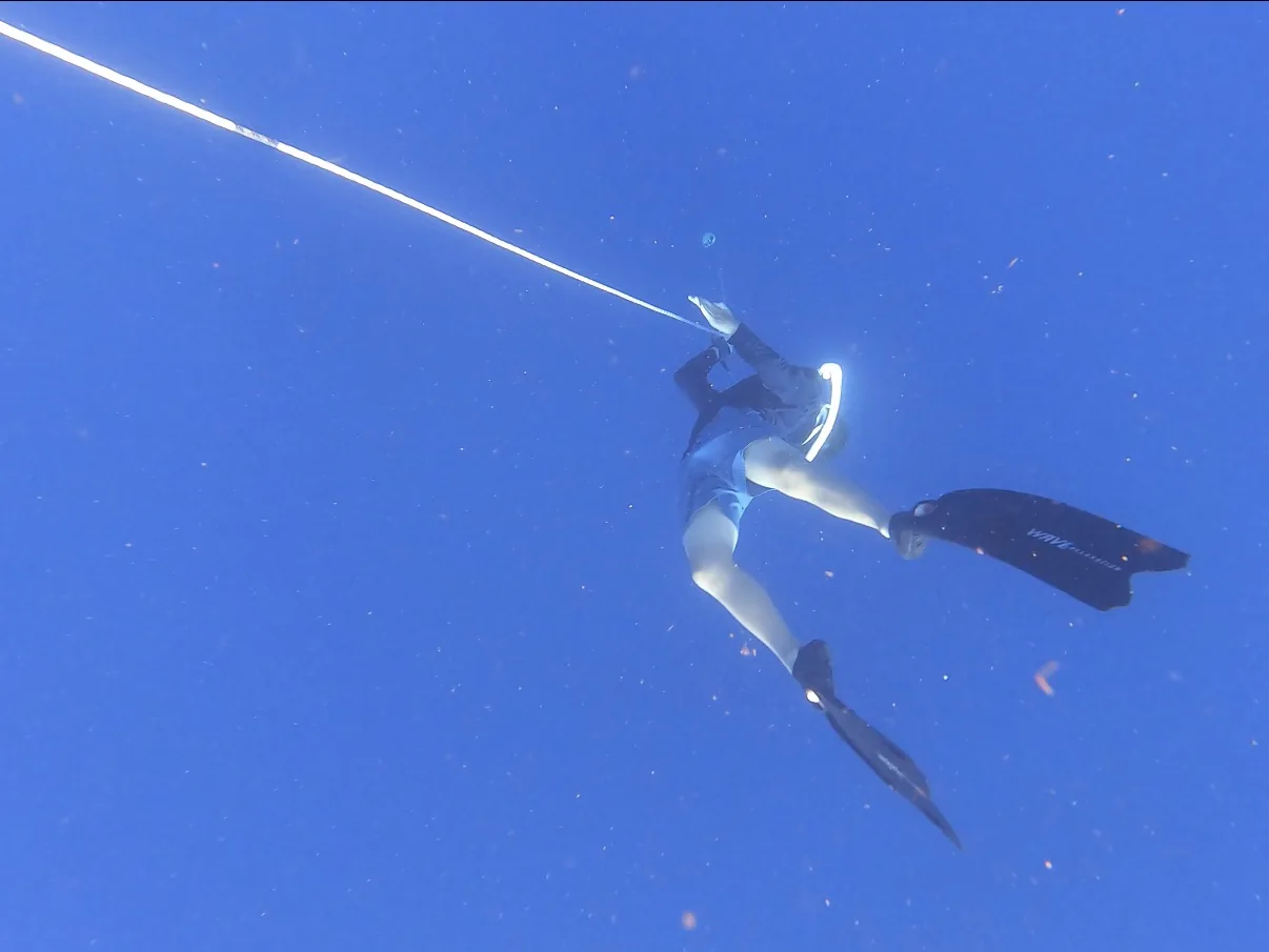 Freediver training on a line